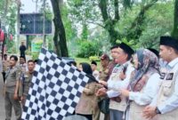 Foto Ist: Wakil Bupati Tangerang Intan Nurul Hikmah melepas keberangkatan jemaah haji Kabupaten Tangerang Kloter 15 JKB Tahun 1447 Hijriah/2026 Masehi dengan pengibaran bendera di lokasi pemberangkatan, Senin (11/5/2026). (Doc. Asep Munajat)