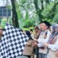 Foto Ist: Wakil Bupati Tangerang Intan Nurul Hikmah melepas keberangkatan jemaah haji Kabupaten Tangerang Kloter 15 JKB Tahun 1447 Hijriah/2026 Masehi dengan pengibaran bendera di lokasi pemberangkatan, Senin (11/5/2026). (Doc. Asep Munajat)